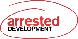 The words "Arrested Development" in red and black lettering