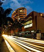 Office tower and restaurant at dusk