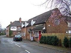 View of the village street, with shop and public house