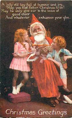 Postcard of Father Christmas with two children