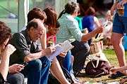 Crowds reading between sessions