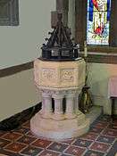  interior of church, showing font