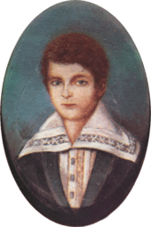 Half-length portrait of a boy with light hair and wearing a jacket over a shirt with an enormous, embroidered collar.