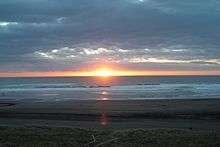 Sunset at Karioitahi Beach.