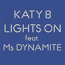A blue background with the words "KATY B LIGHTS ON feat. Ms DYNAMITE" in white