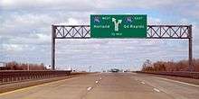 The overhead gantry with signs at