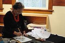 Midori Kono Thiel doin sumi-e painting at Culture Day at Seattle's Nihon Go Gakko / Japanese Cultural & Community Center (Photo from 2009)