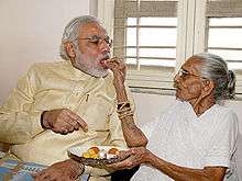 Modi being fed by his mother