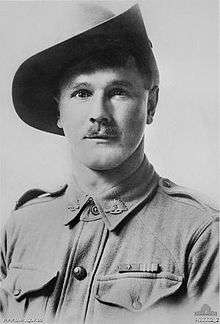 A head and shoulders portrait of a man in military uniform.