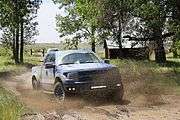 Raptor Slashing Through Mud