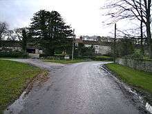 a row of houses, several in stone