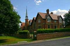 Stone church in Gothic style, with at least three towers