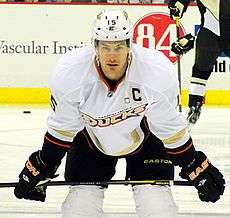 Getzlaf as he gets ready for a faceoff. He's in full uniform, including an "C" patch denoting his role as an captain.