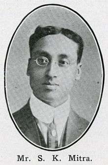  Black and white closeup photograph of a young man.