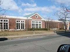 picture of a building on the other side of a street.