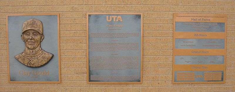 A The memorial Clay Gould and fundraising plaques outside the entrance to Clay Gould Ballpark.