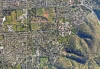 Aerial view of wetland surrounded by suburbs