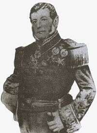 Engraved, half length portrait of a man with dark hair and graying sideburns dressed in an elaborately embroidered naval uniform with a double-breasted tunic adorned with epaulettes and medals and holding a bicorn admiral's hat under his right arm