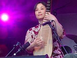 Wu Man performing at WOMAD in 2011.